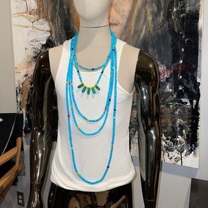 Multi strand turquoise tribal necklace. Multiple color stones with silver toggle